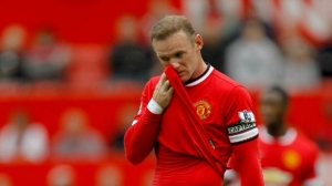 'Irresponsible' Rooney apologises for red card incident