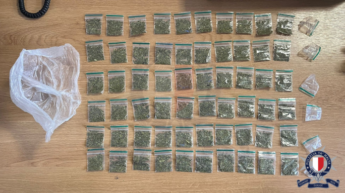 Police arrest two men carrying synthetic cannabis packets, cash