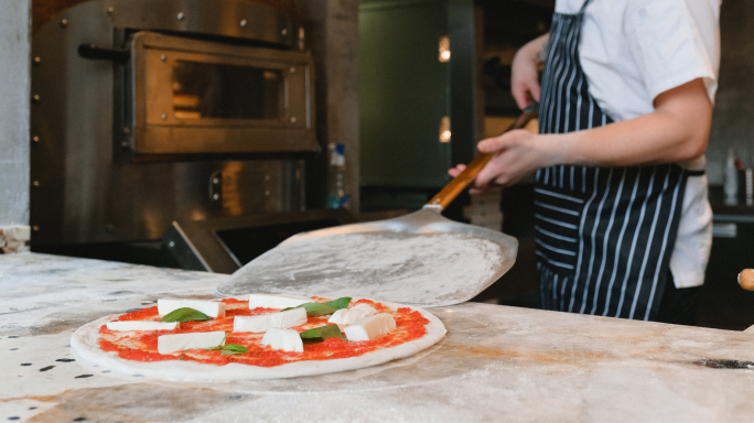 Pizza chef pleads not guilty to punching co-worker in the face