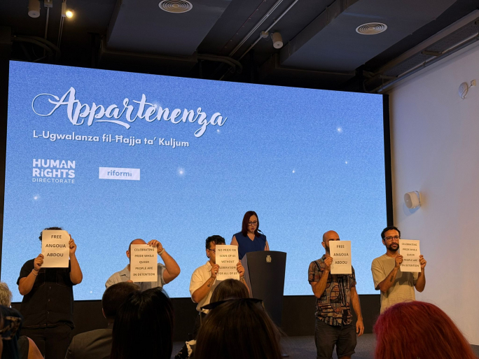 MGRM activists interrupt Equality Parliamentary Secretary speech over detained member