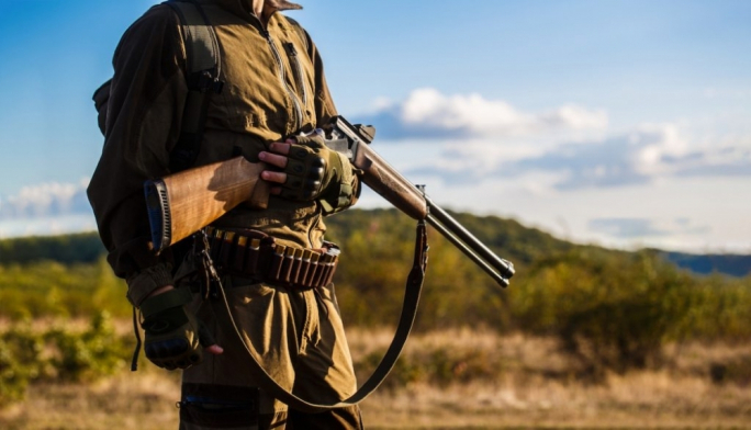 Hunter cleared of illegal hunting and firearm possession due to insufficient evidence