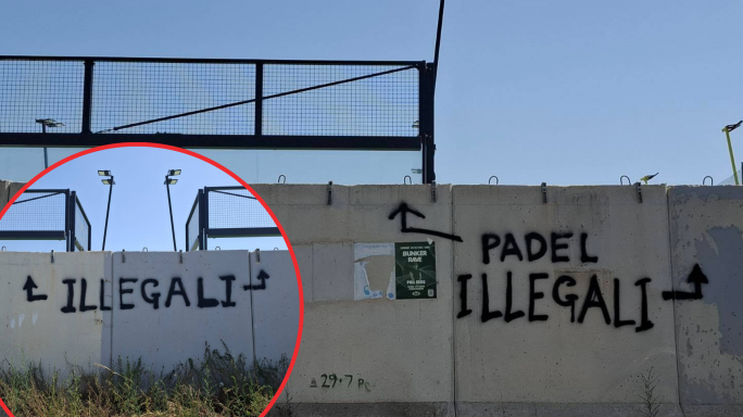 Activists spray paint the word 'illegal' on wall outside Manoel Island's illegal padel courts
