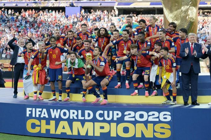 Trump can’t help but make it about him as he lingers on stage following World Cup trophy presentation