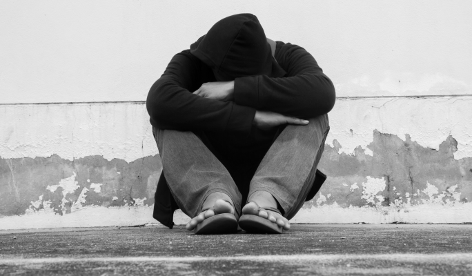 Homeless man found living on the street, taken to hospital, before being arrested