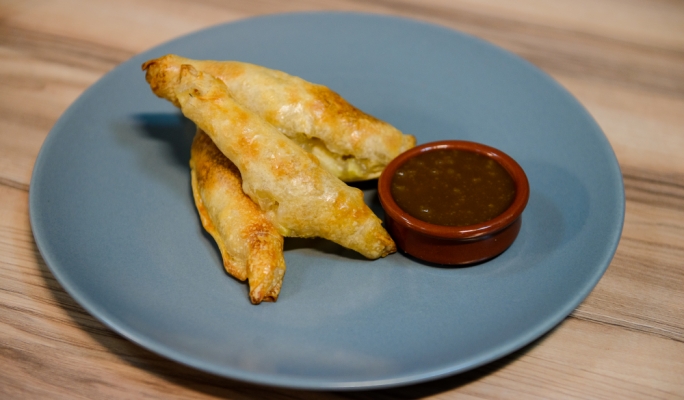 Apple strudel cigars with butterscotch sauce