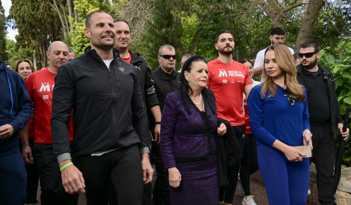 Thousands join president in charity walk for MCCF