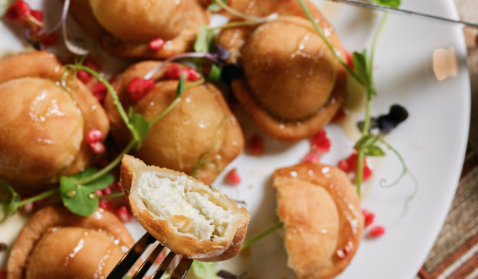 Fried Goat Cheese Ravioli with Carob Syrup & Pomegranates